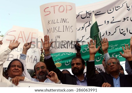 KARACHI, PAKISTAN - JUN 10: Members of Rice Exporters Association chant slogans against massacre of Rohangya Muslims in Burma on June 10, 2015  Karachi.