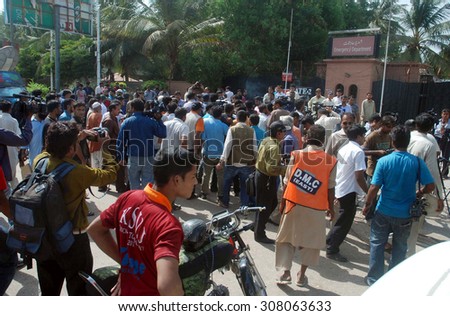 KARACHI, PAKISTAN - AUG 20: Journalists are protesting against security staffs of a private hospital after clash during coverage of news on August 20, 2015 in Karachi.