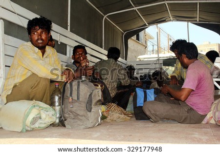 PESHAWAR, PAKISTAN - OCT 19: Docks police officials escorting Indian Fishermen to City Court on October 19, 2015 in Karachi. Pakistan arrested 27 Indian fishermen and impounded their four boats