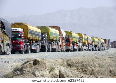 CHAMAN, PAKISTAN, OCT 02: A long queue of NATO oil tankers is waiting for security clearance for going  to Afghanistan at check post on October 2, 2010 in Chaman, Pakistan.