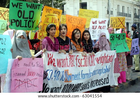LAHORE, PAKISTAN - OCT 14:  Students of different medical colleges shout slogans against the admissions procedure for medical colleges during protest demonstration on October 14, 2010 in Lahore.