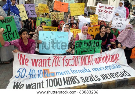 LAHORE, PAKISTAN - OCT 14:  Students of different medical colleges shout slogans against the admissions procedure for medical colleges during protest demonstration on October 14, 2010 in Lahore, Pakistan.