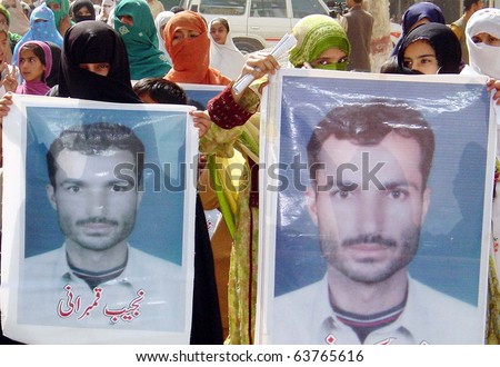 QUETTA, PAKISTAN - OCT 23: Residents of Quetta protest for recovery of all missing persons including Najeeb Kambarani during a demonstration at press club on October 23, 2010 in Quetta.