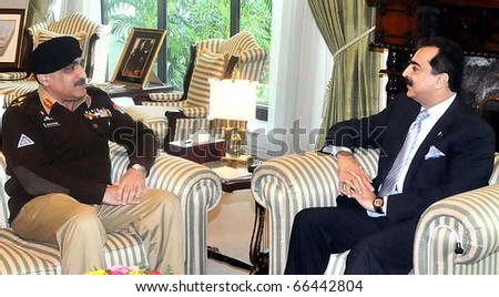 ISLAMABAD, PAKISTAN - DEC 02: Prime Minister, Syed Yousuf Raza Gilani, in meeting with Gen.Khalid Shamim Wynne, Chairman Joint Chiefs of the Staff Committee (JCSC), on December 02, 2010 in Islamabad, Pakistan.