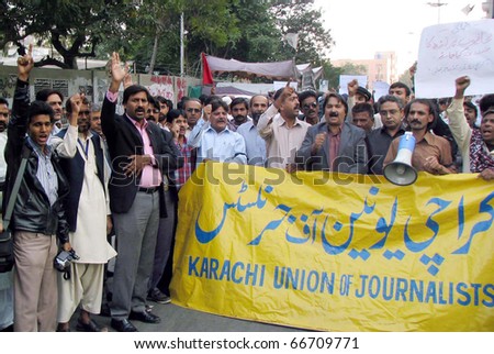 KARACHI, PAKISTAN - DEC 06: Members of Karachi Union of Journalists are protesting in favor of their demands during demonstration at press club on December 06, 2010 in Karachi, Pakistan.