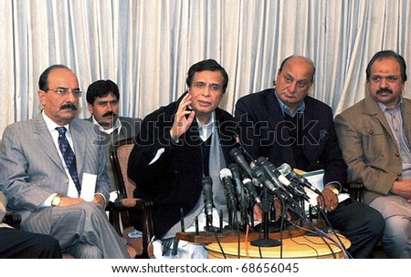 LAHORE, PAKISTAN - JAN 09: Muslim League-Q leader, Ch.Pervez Elahi gestures during press conference at his residence on January 09, 2011in Lahore.