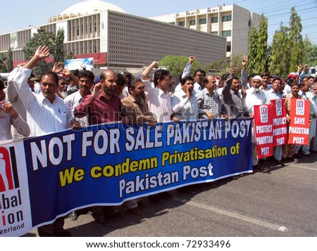 KARACHI, PAKISTAN - MAR 10: Supporters of Postal Action Committee for Anti- Privatization chant slogans in favor of their demands during protest rally on March 10, 2011in Karachi, Pakistan.