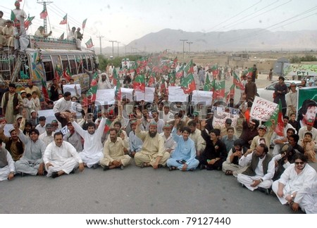 QUETTA, PAKISTAN - JUN 12: Supporters of Tehreek-e-Insaf (PTI) protest against US drone attacks during demonstration on June 12, 2011in Quetta.