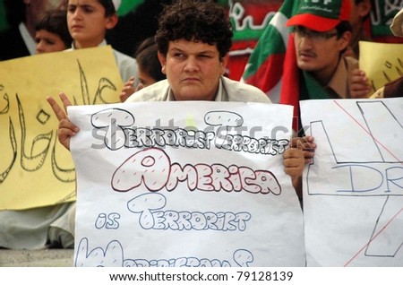 QUETTA, PAKISTAN - JUN 12: Supporters of Tehreek-e-Insaf (PTI) protest against US drone attacks during demonstration on June 12, 2011 in Quetta.