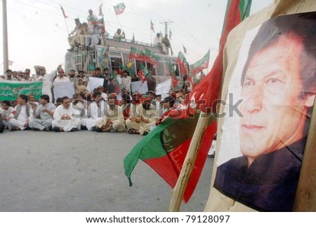 QUETTA, PAKISTAN - JUN 12: Supporters of Tehreek-e-Insaf (PTI) protest against US drone attacks during demonstration  on June 12, 2011 in Quetta.
