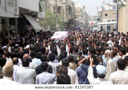 KARACHI, PAKISTAN - JUL 24: People carry coffin of Mukhtar Bukhari advocate who was gunned down by unidentified gunmen yesterday, for burial after offer his funeral prayer on July 24, 2011in Karachi, Pakistan.