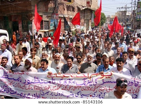 HYDERABAD, PAKISTAN - SEPT 21: Supporters of WAPDA Hydro Electric Central Labor Union are protesting in favor of their demands during rally on September 21, 2011 Hyderabad .
