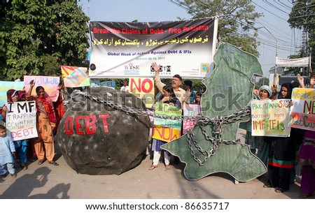 LAHORE, PAKISTAN - OCT 14: Activists of Labor Party (LPP) shout slogans against International Monetary Fund (IMF) during protest demonstration in Lahore, Pakistan on Friday, October 14, 2011.
