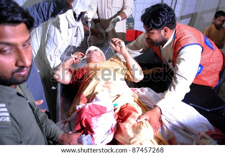 PESHAWAR, PAKISTAN - OCT 26: An injured man who was injured in an explosion, being treated at Lady Reading hospital (LRH) on October 26, 2011in Peshawar.