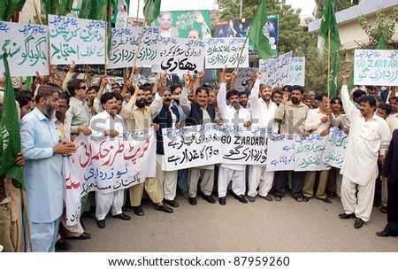 HYDERABAD, PAKISTAN, NOV 02: Supporters of Muslim League-N chant slogans in favor of their demands during protest rally on November 02, 2011in Hyderabad .