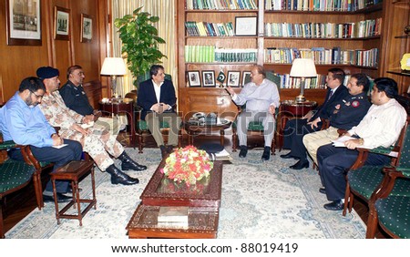 KARACHI, PAKISTAN - NOV 03: Sindh Governor, Dr.Ishrat-ul-Ibad Khan presides over a meeting about law and order situation held at Governor House on November 03, 2011 in Karachi, Pakistan.
