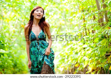 An attractive woman taking a walk through her resort