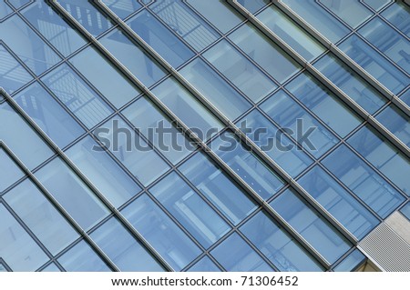 Modern glass building facade - Abstract background.