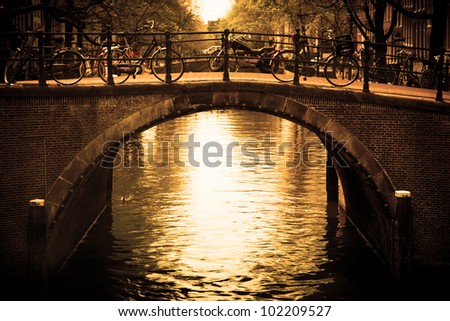 Amsterdam, Holland, Netherlands. Romantic bridge over canal. Old town