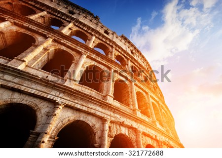 Colosseum in Rome, Italy. Symbol of the ancient city. Amphitheatre in sunset light.