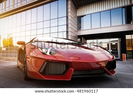 Red fast sports car in modern urban setting. Generic, brandless design. 3D rendering