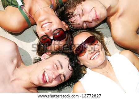 Young attractive friends enjoying the summertime and company of each other.