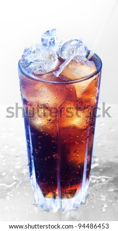 A fresh glass of cola with ice. Top view