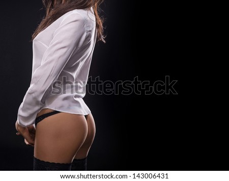 Sexy girl in black underwear and white shirt