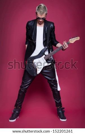Man holding guitar