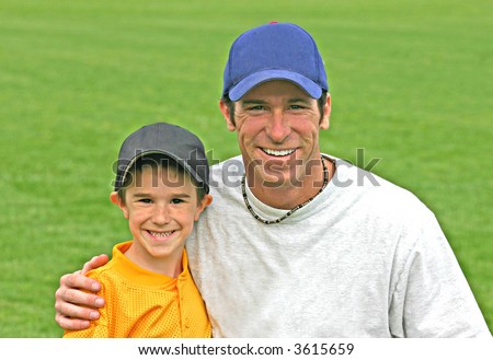 Father and Son Wearing Baseball Hats