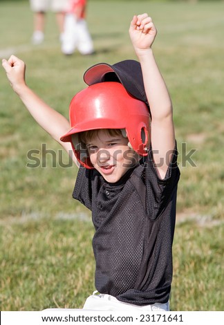 Little Boy Cheering about the Game