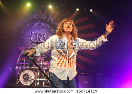 RALEIGH, NC - JULY 31: Lead singer David Coverdale and the classic rock band Whitesnake performs live in concert, on July 31, 2013.