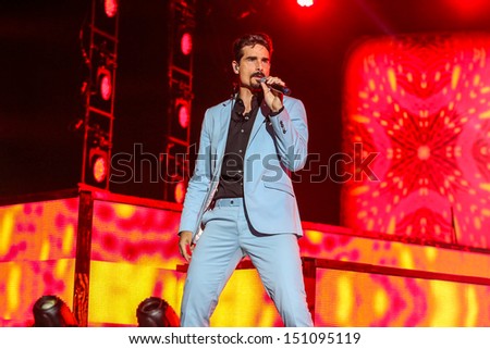 Raleigh, NC - August 20:  Kevin Richardson of The Backstreet Boys live in concert on their 20th anniversary and In A World Like This Tour on August 20, 2013 in Raleigh, NC.