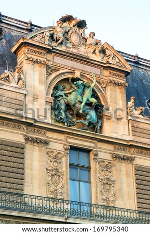 PARIS - SEPTEMBER 20: Detail of the exterior of the Louvre, Paris. The Louvre  is one of the largest museums in the world and one of the major tourist  attractions of Paris.