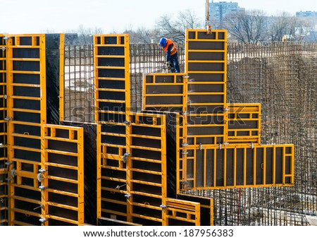 MOSCOW - APRIL 17: Construction site worker on april 17, 2014 in Moscow, Russia. Urban construction is at a faster pace in Russia.