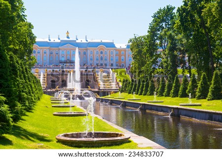 ST PETERSBURG, RUSSIA - JUNE 15, 2014: Fountains and Sea Channel in Peterhof Palace. The Peterhof Palace included in the UNESCO\'s World Heritage List.