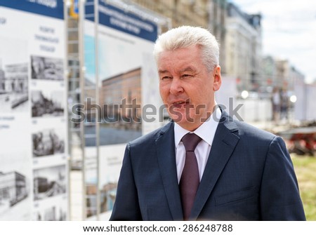 MOSCOW - JUNE 11, 2015: Moscow Mayor S. Sobyanin visits the Triumph Square. This is one of the central squares of Moscow, which conducted large-scale reconstruction.