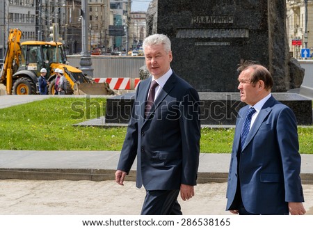 MOSCOW - JUNE 11, 2015: Moscow Mayor S. Sobyanin and his deputy visited the Triumph Square. This is one of the central squares of Moscow, which conducted large-scale reconstruction.