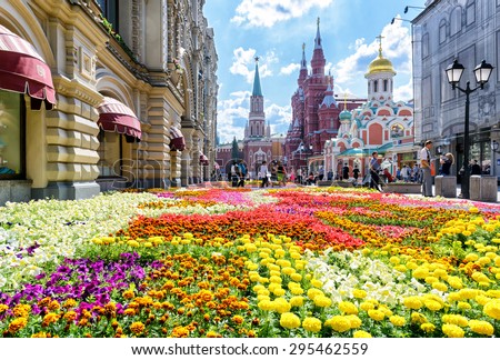 MOSCOW - JULY 10, 2015: Flower Festival near GUM (main department store) in the center of Moscow. GUM - one of the oldest supermarkets in the city.