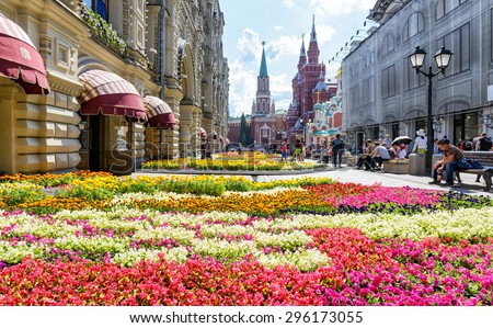 MOSCOW - JULY 10, 2015: Flower Festival near GUM (main department store) in the center of Moscow. GUM - one of the oldest supermarkets in the city.