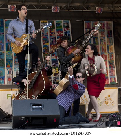 NEW YORK - APRIL 28: Cast of Broadway musical Million Dollar Quartet performs on stage at Family festival during the 2012 Tribeca Film festival on Greenwich street on April 28, 2012 in New York City