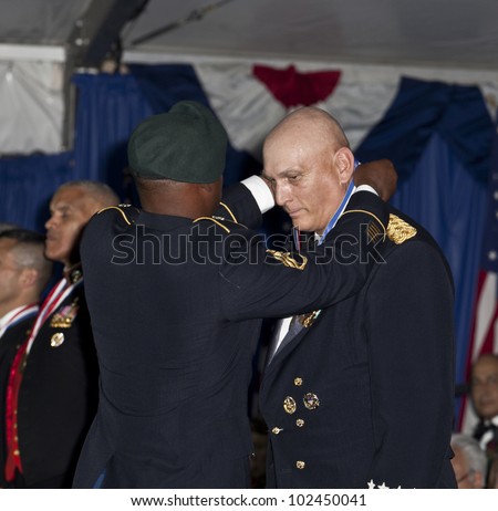 NEW YORK - MAY 12: General Raymond Odierno Chief of Staff US Army receives medal at the 2012 Ellis Island Medals of Honor ceremony on Ellis Island on May 12, 2012 in New York