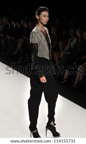 NEW YORK - SEPTEMBER 07: Model walks the runway for Project Runway Collection by Dmitry Sholokhov during Spring/Summer 2013 at Mercedes-Benz Fashion Week on September 07, 2012 in New York