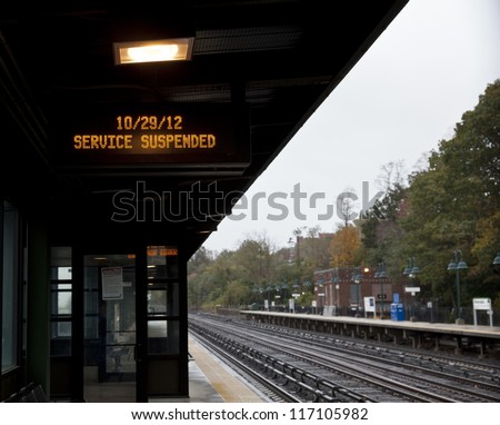 NEW YORK - OCTOBER 29: Riverdale station of Metro-North sign informing that railroad service is suspended in preparation for hurricane Sandy on October 29, 2012 in New York City