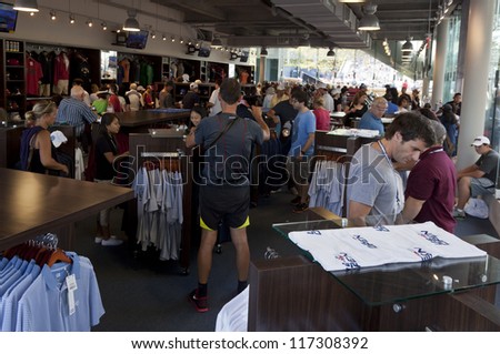 NEW YORK - AUGUST 28: Customers buying US Open apparel at the store at US Open tennis tournament on August 28, 2012 in Flushing Meadows New York