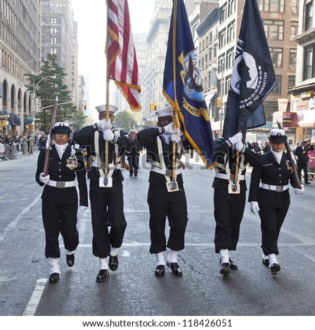 NEW YORK - NOVEMBER 11: Members of US Navy walk at Veteran\'s Day Parade along 5th Avenue on November 11, 2012 in New York City
