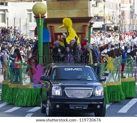NEW YORK - NOVEMBER 22: Cast of Sesame Street show rides the float at the 86th Annual Macy\'s Thanksgiving Day Parade on November 22, 2012 in New York City.
