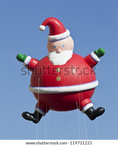 NEW YORK - NOVEMBER 22: Santa Claus balloon is flown at the 86th Annual Macy\'s Thanksgiving Day Parade on November 22, 2012 in New York City.