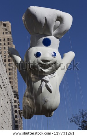 NEW YORK - NOVEMBER 22: Pilsbury Doughboy balloon is flown at the 86th Annual Macy\'s Thanksgiving Day Parade on November 22, 2012 in New York City.