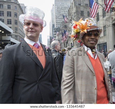NEW YORK - MARCH 31: Unidentified men partake and show off their hats at the Easter Bonnet Parade on 5th Avenue on March 31, 2013 in New York City.